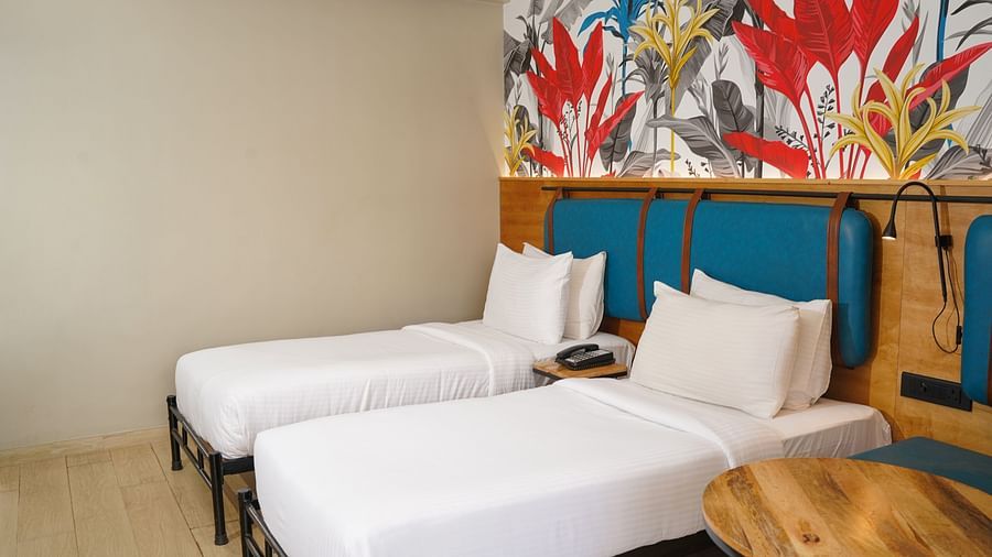 Twin beds in Cozy Twin Room at Indie Stays Resort, Goa.
